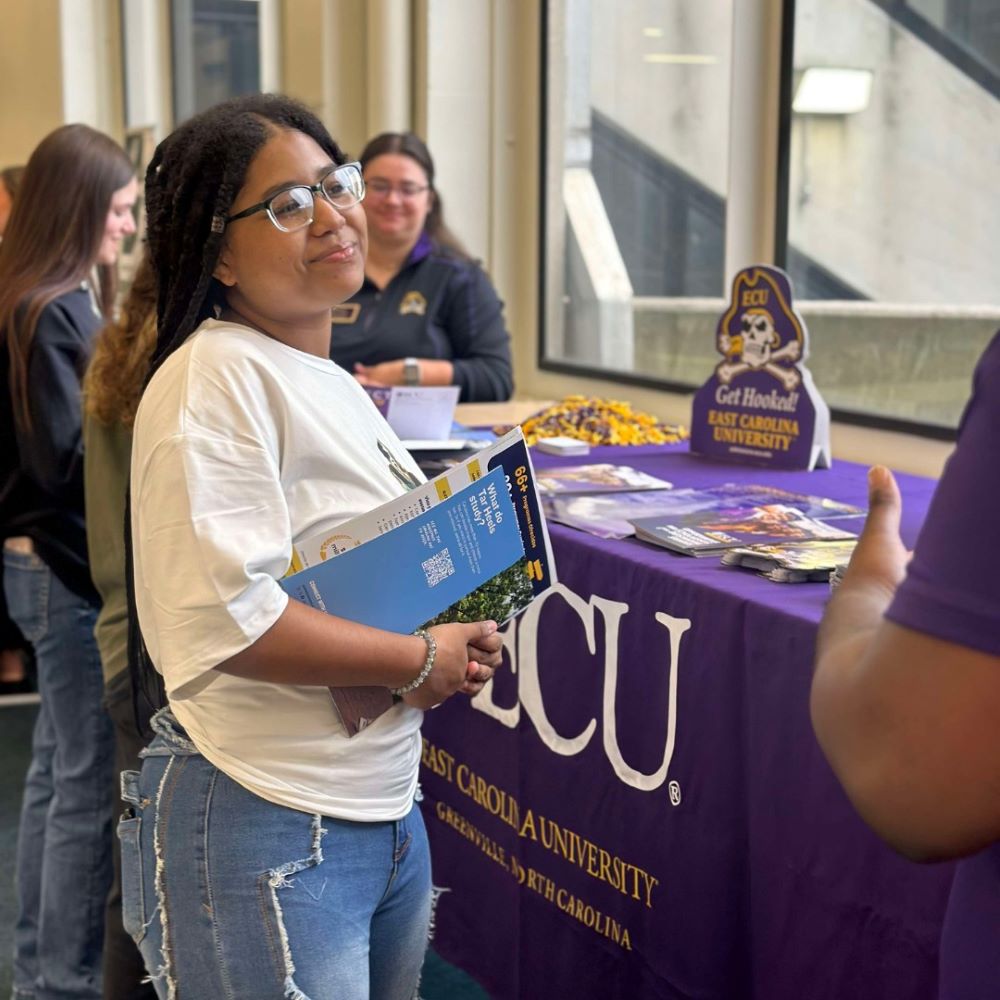 female student talking with recruiter from ECU