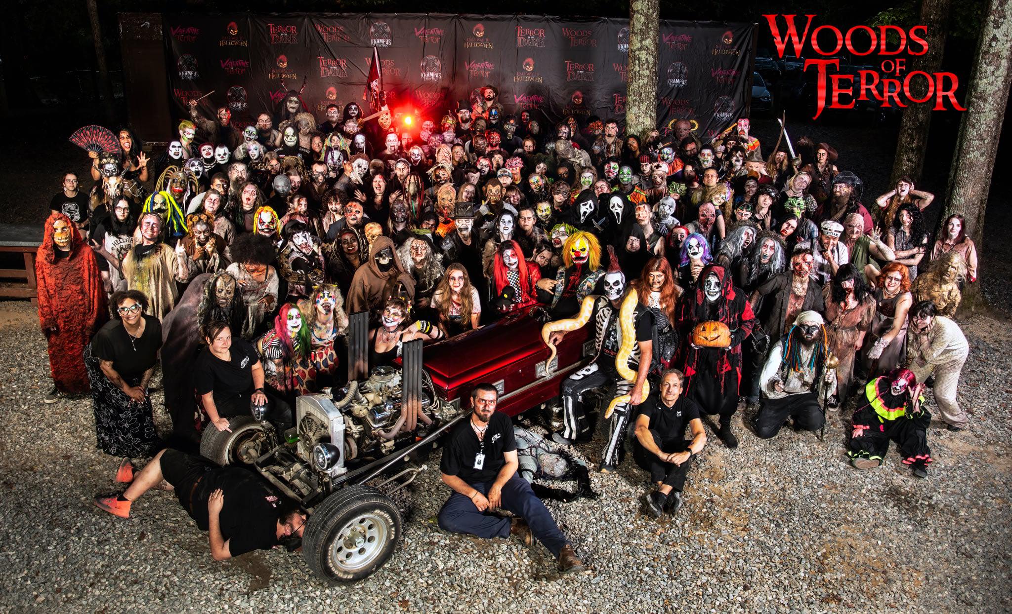 actors dressed up in halloween outfits at the woods of terror